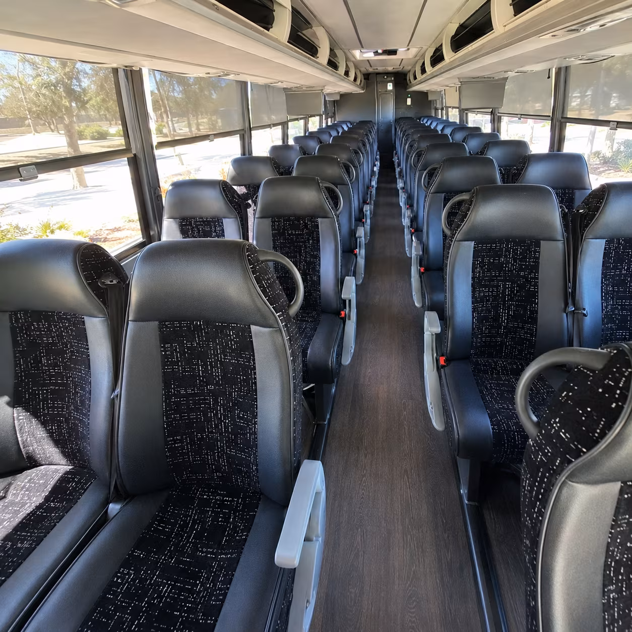 norman convention charter bus rental